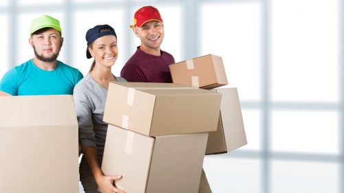 Student removal team preparing boxes for a move in Highbury