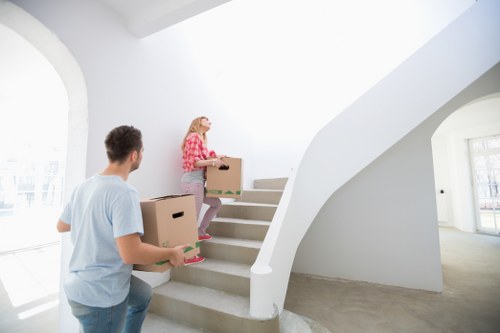 Professional movers handling access challenges in a Highbury flat