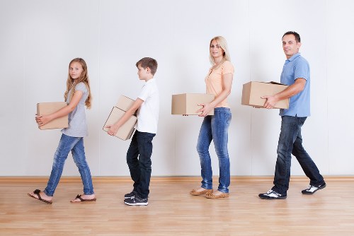 Packed boxes and furniture ready for a student move in Highbury